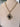 Black Stone Cross Gold Necklace by Yochi