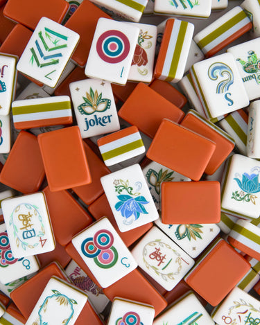 mahjong tiles in rich colors of caramels and green