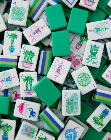 mahjong tiles with sea greens and blues